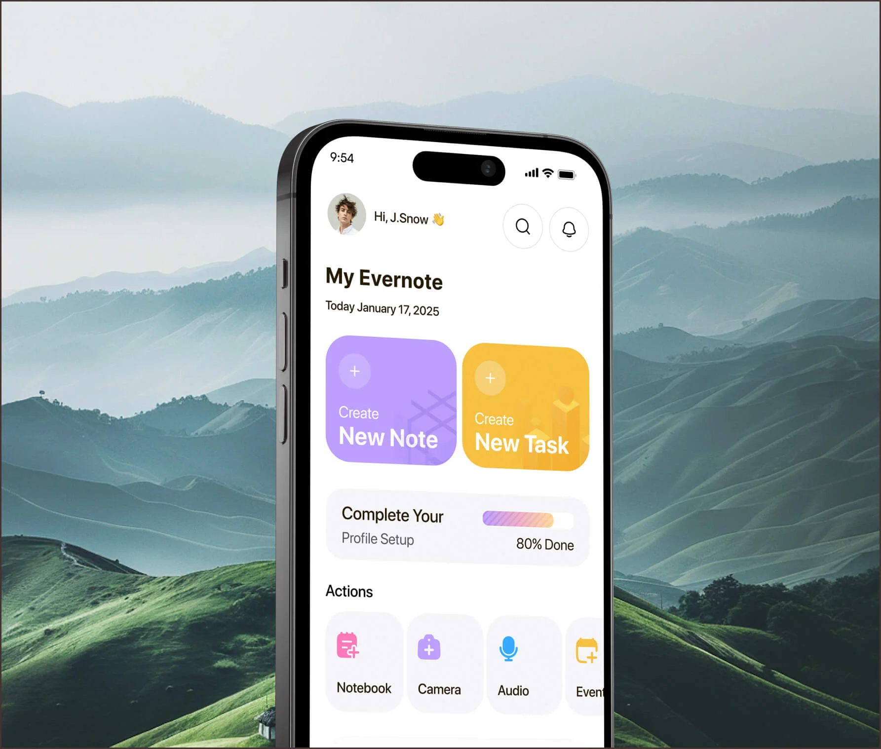 iPhone showing a notes app against misty green mountains