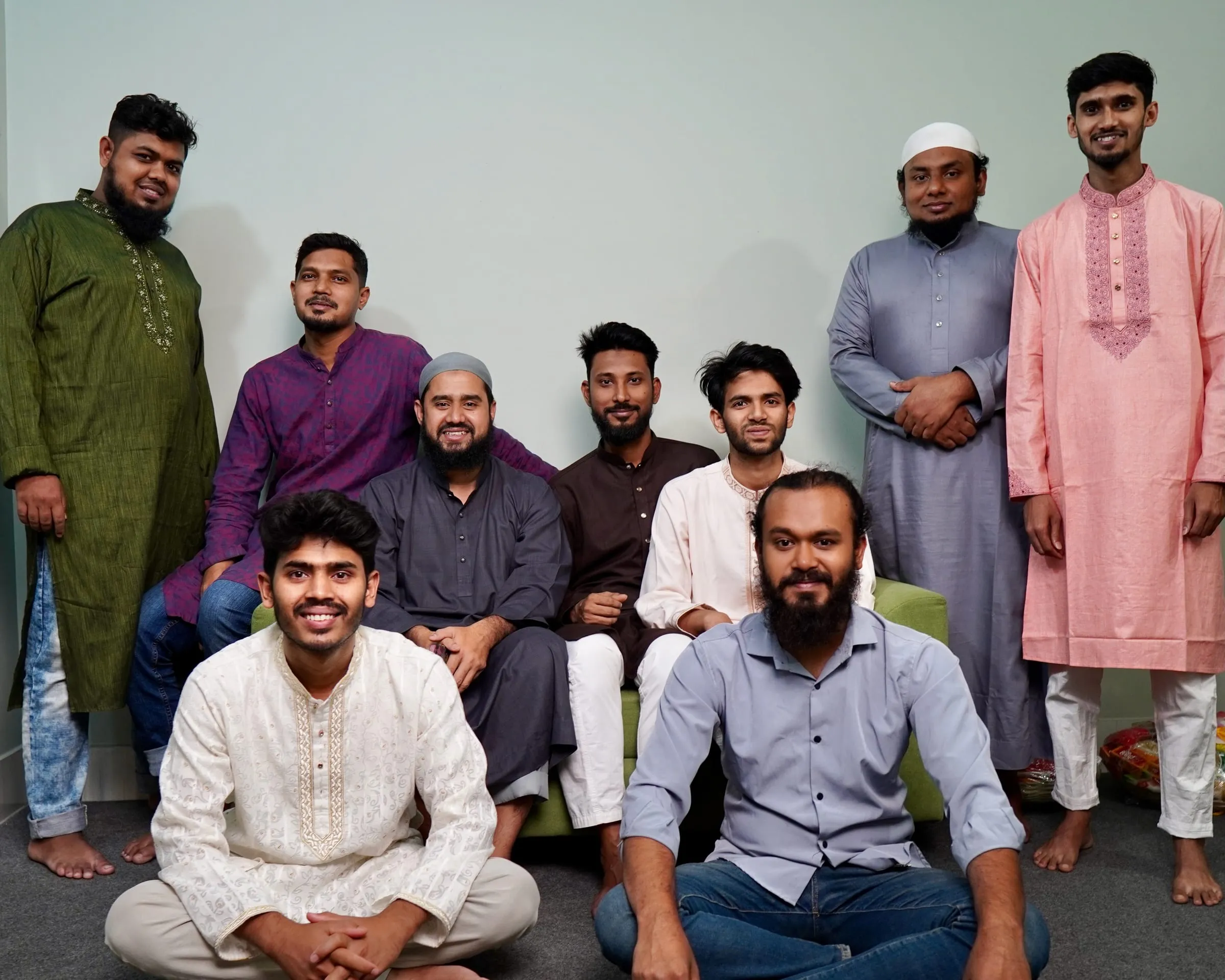 The Panze team together in the studio in traditional dress for Eid